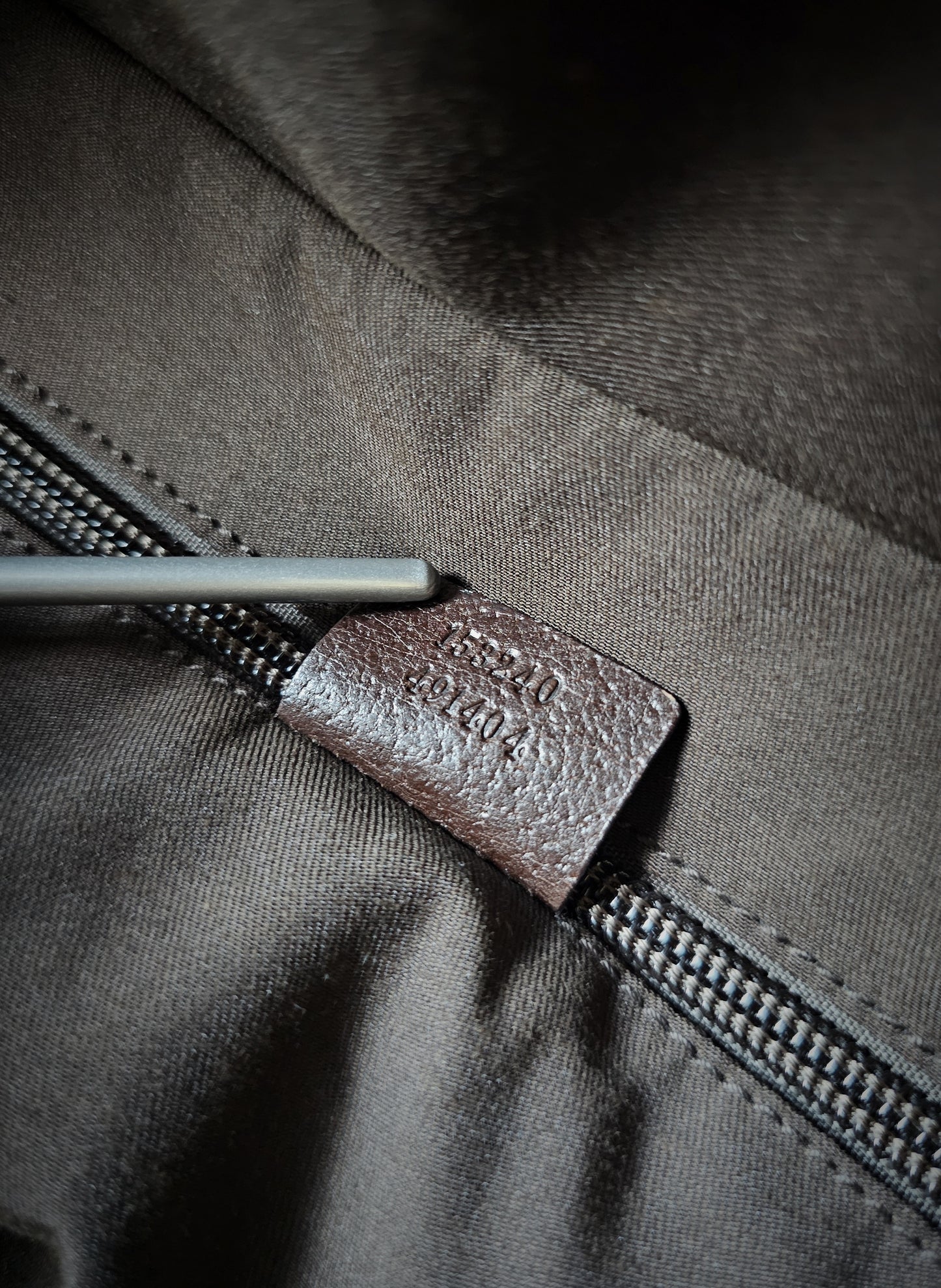 GUCCI GG Leather and webbing-trimmed Supreme Monogram Duffle Bag