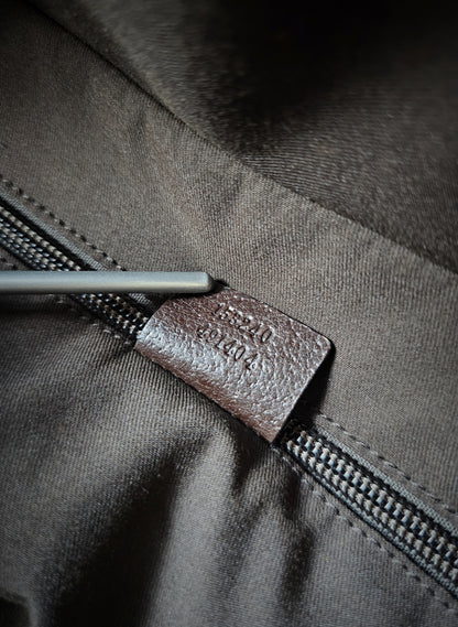 GUCCI GG Leather and webbing-trimmed Supreme Monogram Duffle Bag
