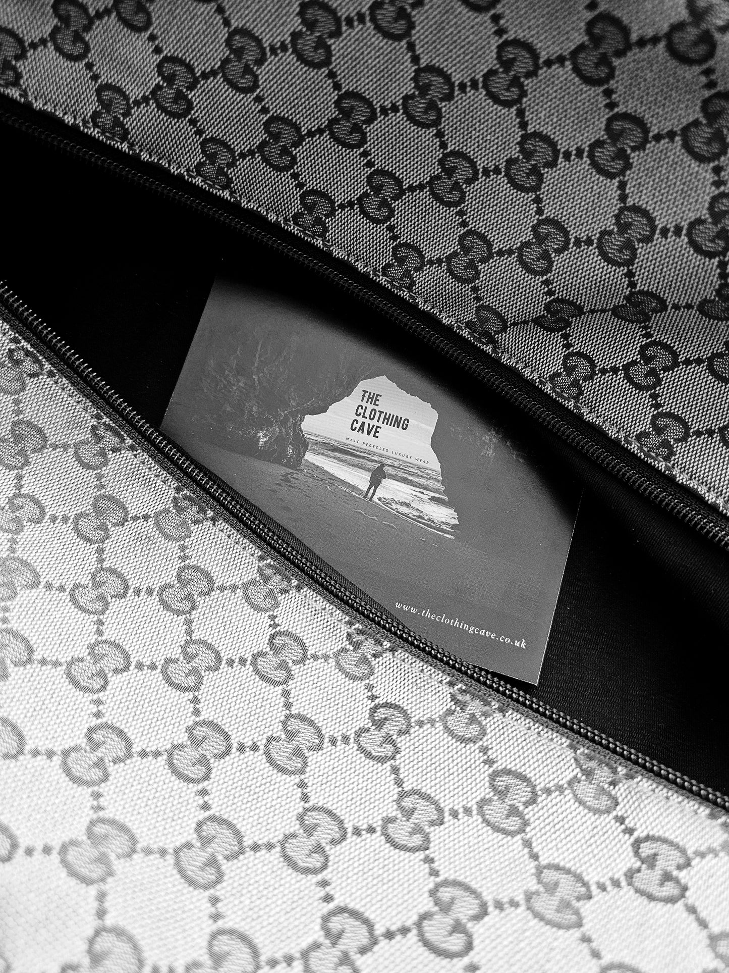 GUCCI GG Leather and webbing-trimmed Supreme Monogram Duffle Bag