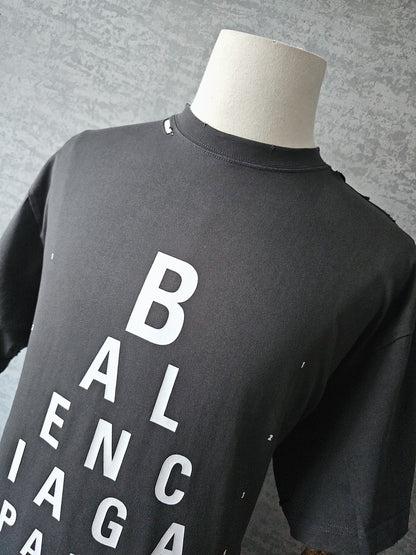 BALENCIAGA Optical Print Distressed Oversized T-Shirt