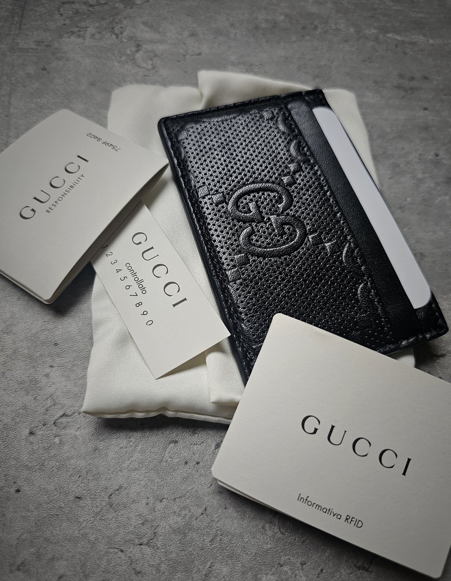GUCCI GG Embossed Leather Card Holder