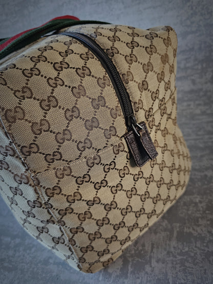 GUCCI GG Leather and webbing-trimmed Supreme Monogram Duffle Bag